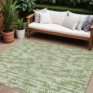 Photo of Green And Ivory Tribal Washable Indoor Outdoor Area Rug
