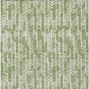 Photo of Green And Ivory Tribal Washable Indoor Outdoor Area Rug
