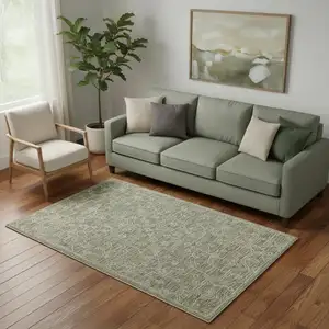 Photo of Green And Ivory Wool Floral Hand Tufted Area Rug