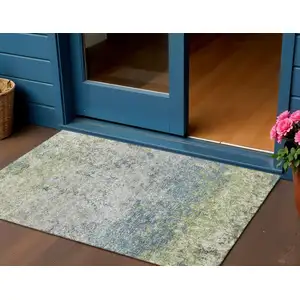 Photo of Green And Navy Blue Abstract Washable Indoor Outdoor Area Rug