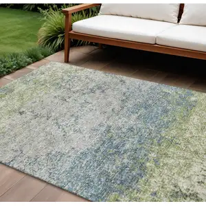 Photo of Green And Navy Blue Abstract Washable Indoor Outdoor Area Rug
