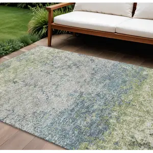 Photo of Green And Navy Blue Abstract Washable Indoor Outdoor Area Rug