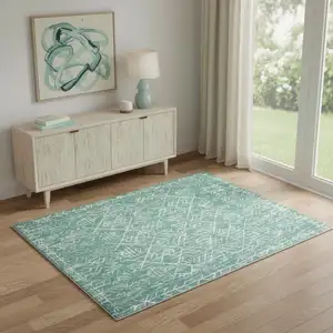 Photo of Green And Off White Abstract Geometric Distressed Washable Area Rug