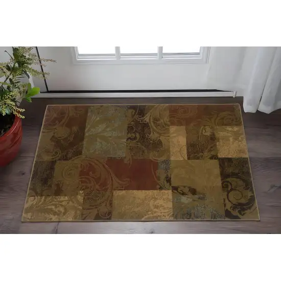 Green And Red Geometric Power Loom Stain Resistant Area Rug Photo 1