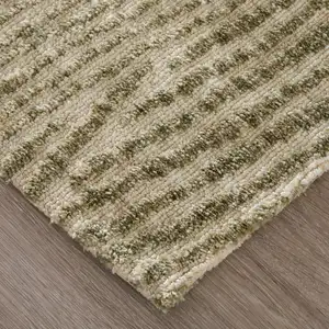 Photo of Green And Tan Abstract Area Rug