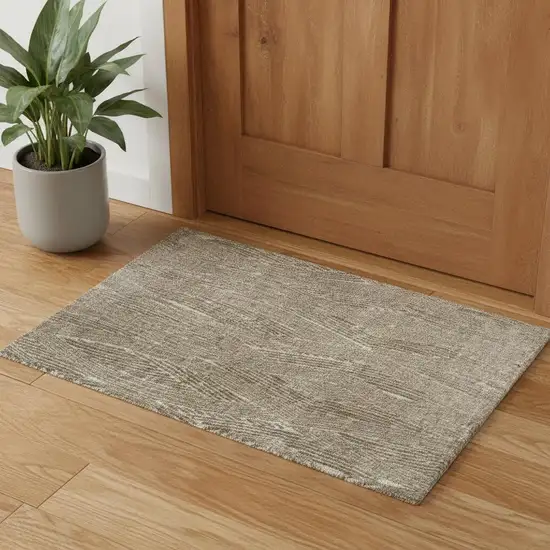 Green And Tan Abstract Area Rug Photo 1