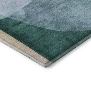 Photo of Green And Teal Abstract Washable Area Rug With UV Protection