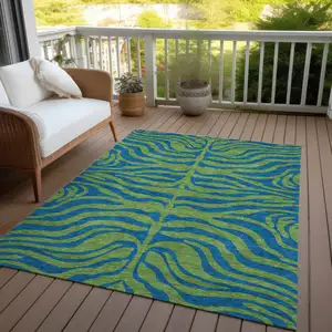 Photo of Green And Teal Blue Animal Print Washable Indoor Outdoor Area Rug