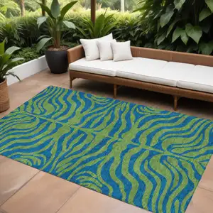 Photo of Green And Teal Blue Animal Print Washable Indoor Outdoor Area Rug