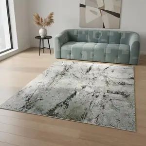 Photo of Green And White Abstract Washable Area Rug With UV Protection