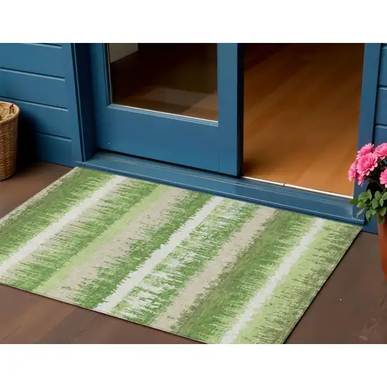 Green Beige And Ivory Striped Washable Indoor Outdoor Area Rug Photo 1