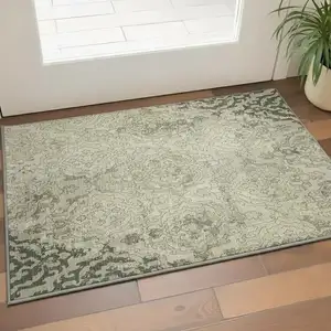 Photo of Green Beige And Taupe Medallion Washable Area Rug With UV Protection