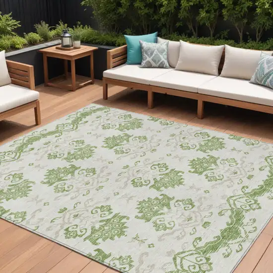 Green Beige And Taupe Oriental Washable Indoor Outdoor Area Rug Photo 1