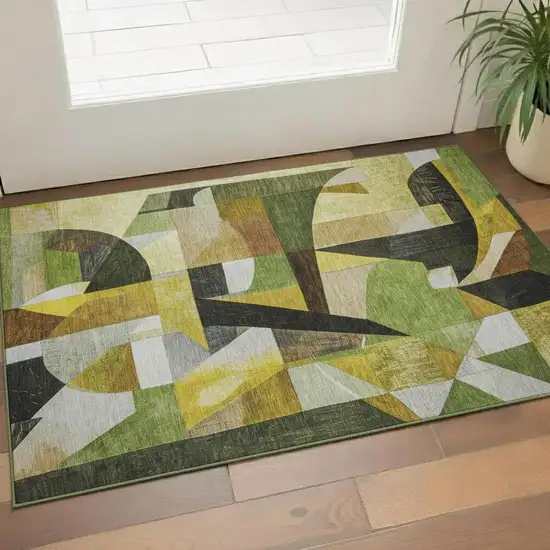 Green Black And Gold Abstract Washable Area Rug With UV Protection Photo 2