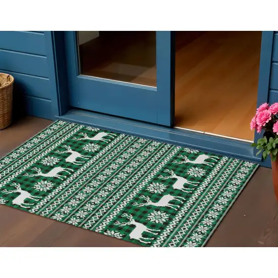 Green Black And Ivory Animal Print Washable Indoor Outdoor Area Rug Photo 2