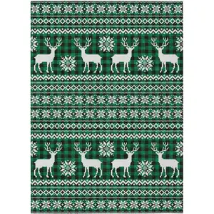 Photo of Green Black And Ivory Animal Print Washable Indoor Outdoor Area Rug