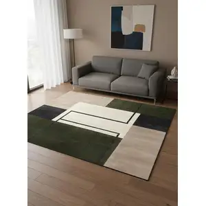 Photo of Green Black And Ivory Geometric Area Rug