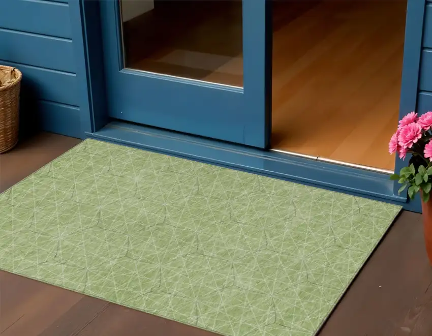 Green Black And Ivory Geometric Washable Indoor Outdoor Area Rug Photo 1