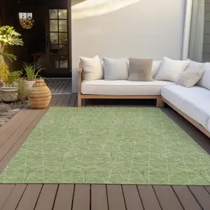 Photo of Green Black And Ivory Geometric Washable Indoor Outdoor Area Rug
