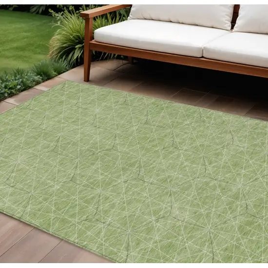 Green Black And Ivory Geometric Washable Indoor Outdoor Area Rug Photo 1