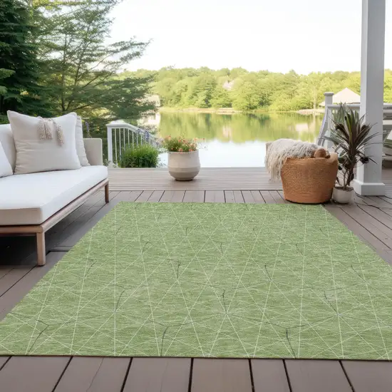 Green Black And Ivory Geometric Washable Indoor Outdoor Area Rug Photo 9