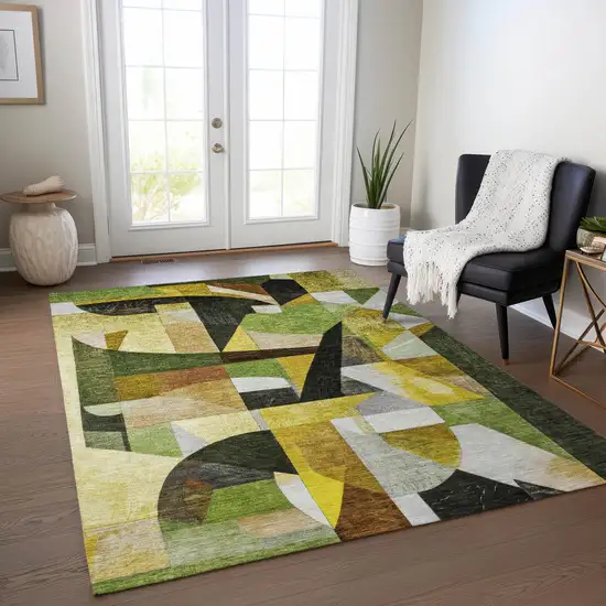 Green Black Gold And Beige Abstract Washable Indoor Outdoor Area Rug Photo 7