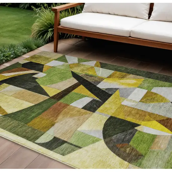 Green Black Gold And Beige Abstract Washable Indoor Outdoor Area Rug Photo 2