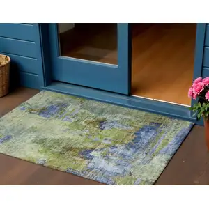 Photo of Green Blue And Brown Abstract Washable Indoor Outdoor Area Rug