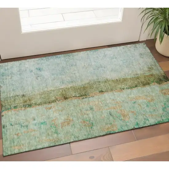 Green Blue And Gold Abstract Washable Area Rug With UV Protection Photo 1