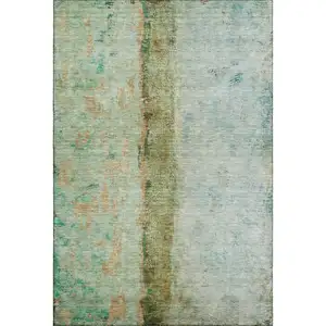 Photo of Green Blue And Gold Abstract Washable Area Rug With UV Protection