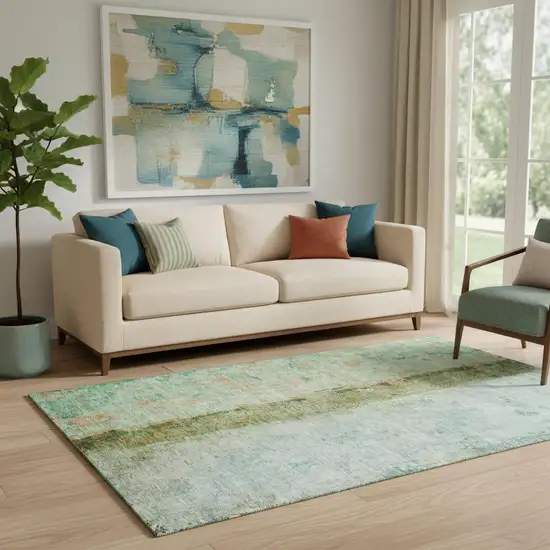 Green Blue And Gold Abstract Washable Area Rug With UV Protection Photo 1
