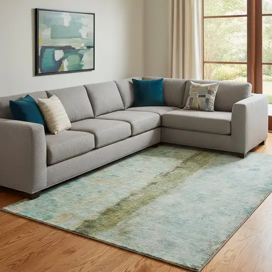 Green Blue And Gold Abstract Washable Area Rug With UV Protection Photo 1