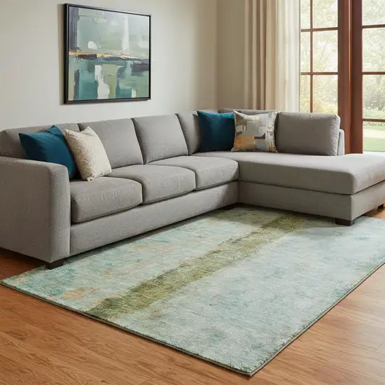 Green Blue And Gold Abstract Washable Area Rug With UV Protection Photo 1