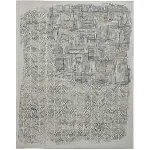 Photo of Green Blue And Ivory Abstract Hand Woven Area Rug