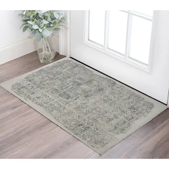 Green Blue And Ivory Abstract Hand Woven Area Rug Photo 1
