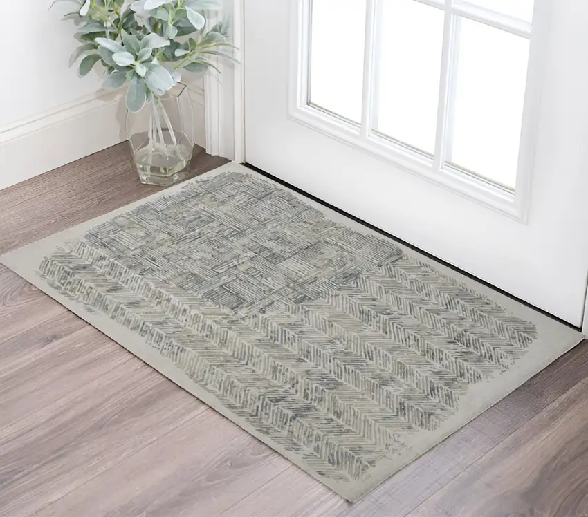 Green Blue And Ivory Abstract Hand Woven Area Rug Photo 1