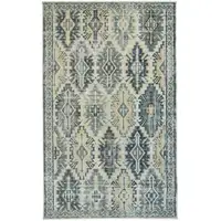 Photo of Green Blue And Ivory Abstract Power Loom Distressed Stain Resistant Area Rug