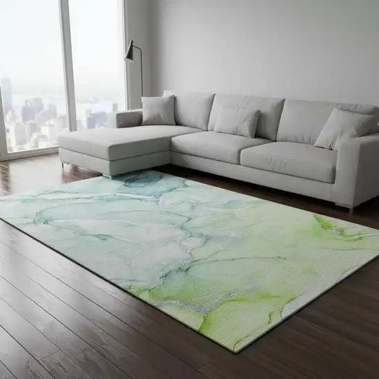 Green Blue And Ivory Abstract Washable Area Rug With UV Protection Photo 1