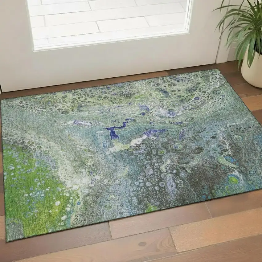 Green Blue And Ivory Abstract Washable Area Rug With UV Protection Photo 1