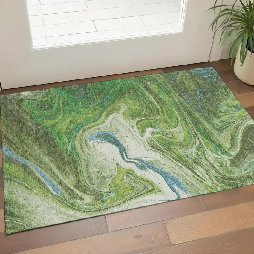 Green Blue And Ivory Abstract Washable Area Rug With UV Protection Photo 1