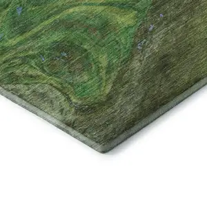 Photo of Green Blue And Ivory Abstract Washable Area Rug With UV Protection