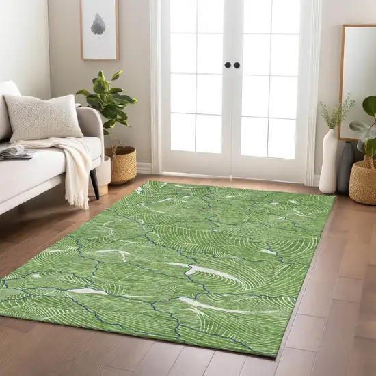 Green Blue And Ivory Abstract Washable Indoor Outdoor Area Rug Photo 9