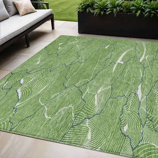 Green Blue And Ivory Abstract Washable Indoor Outdoor Area Rug Photo 1