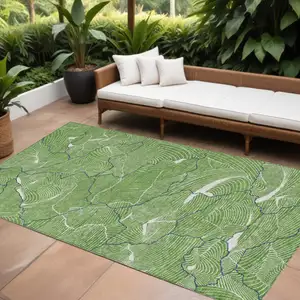 Photo of Green Blue And Ivory Abstract Washable Indoor Outdoor Area Rug