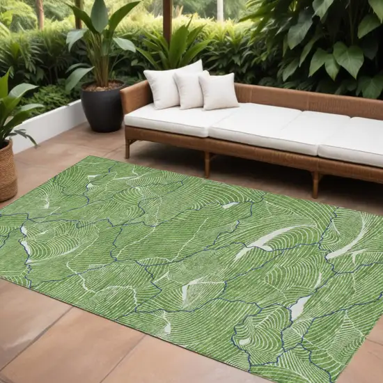 Green Blue And Ivory Abstract Washable Indoor Outdoor Area Rug Photo 1