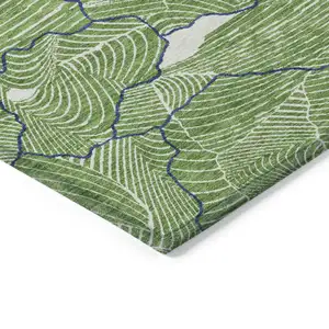 Photo of Green Blue And Ivory Abstract Washable Indoor Outdoor Area Rug