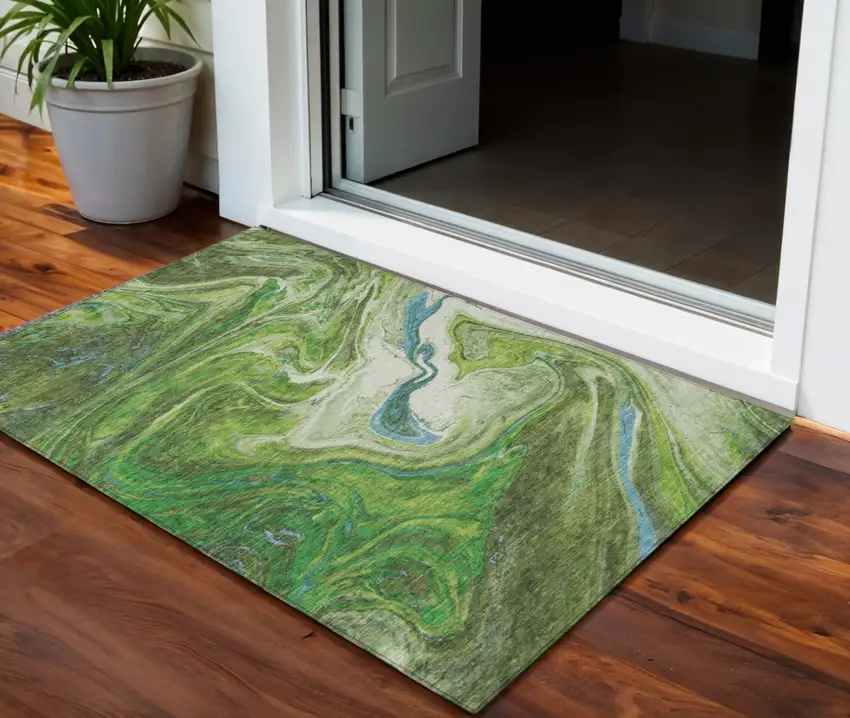 Green Blue And Ivory Abstract Washable Indoor Outdoor Area Rug Photo 1