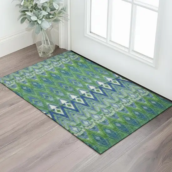 Green Blue And Ivory Southwestern Washable Area Rug With UV Protection Photo 1