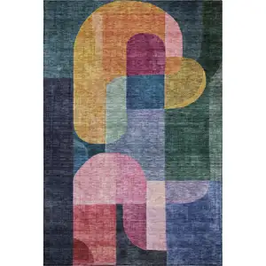 Photo of Green Blue And Pink Abstract Geometric Washable Area Rug With UV Protection