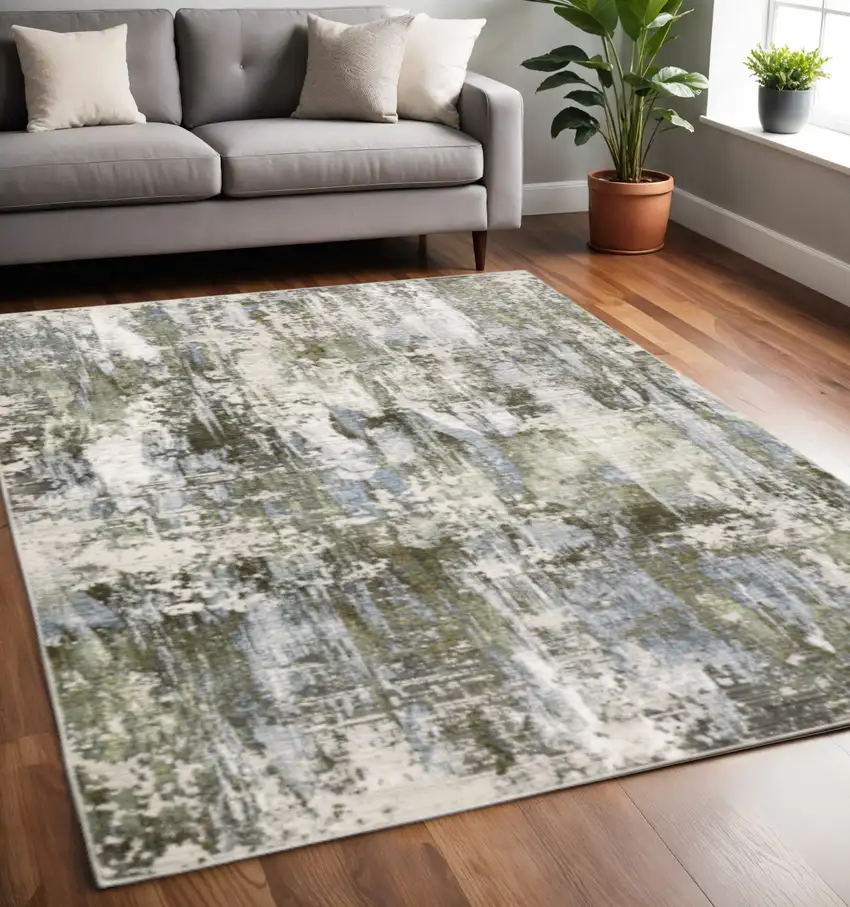 Green Blue Grey Ivory And Brown Abstract Power Loom Stain Resistant Area Rug Photo 1